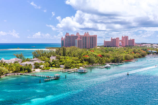 Amazing caribbean beach at Nassau, Bahamas Emerald water idyllic beach at Nassau, The Bahamas in a sunny day. bahamas stock pictures, royalty-free photos & images