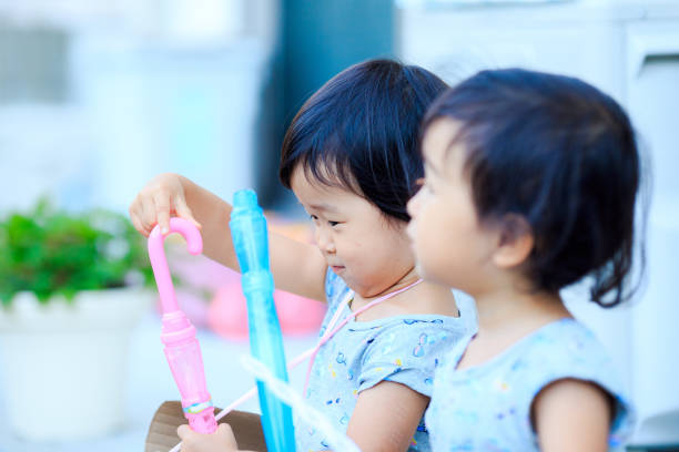 istock Children playing outdoors 864861146