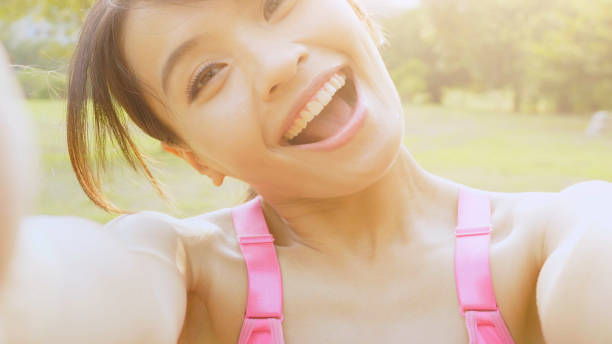 istock Young woman looking at camera 864867184