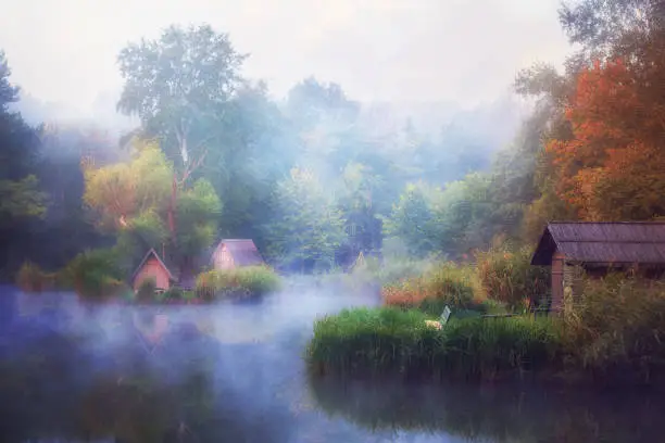 Photo of Dense fog engulfing small fishing pond