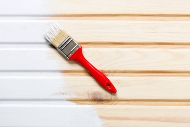 istock Brush and Painted wooden planks with white paint. Copy space and paste text. mockup 864892784