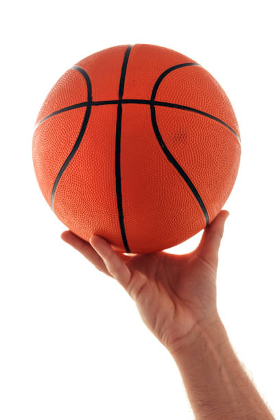 istock Male hand with basketball isolated on white background 864896304
