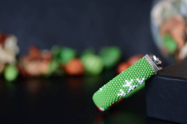 istock Green Christmas bracelet with image of Santa close up 864911708