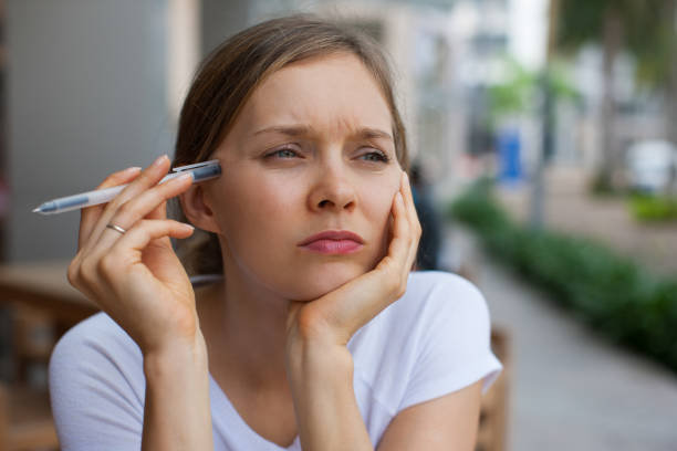 istock Thoughtful Attractive Woman Working Outdoors 864912350