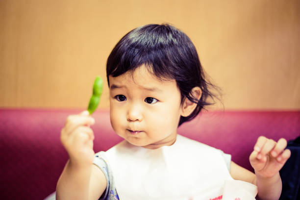 Cute baby with a meal