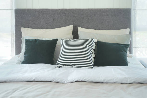 istock Close up bed with pillows in modern style interior bedroom 864925970