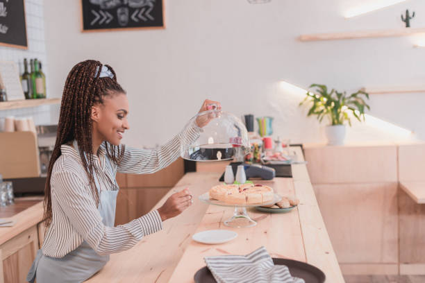 istock barista taking piece of pie 864926222