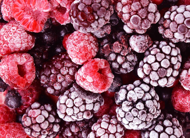 istock Close up of frozen mixed fruit berries red currant, cranberry 864926266