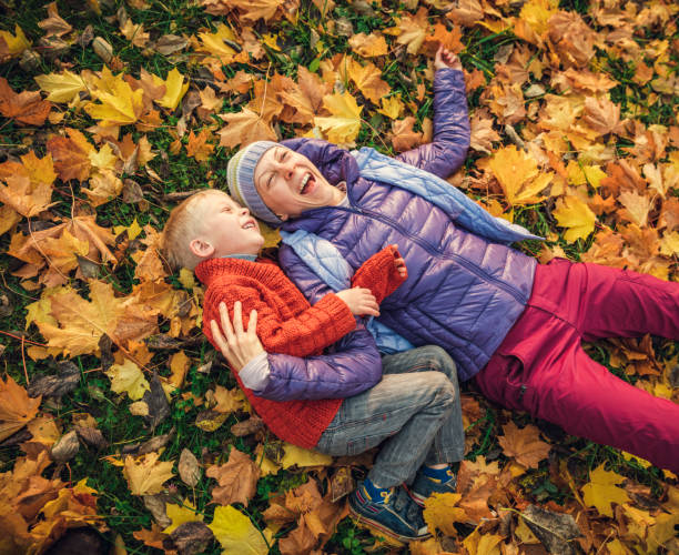 istock Mother and child in the park 864933054