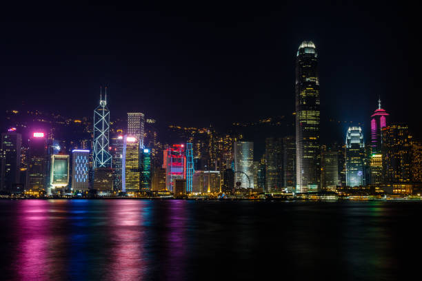 istock Hong Kong Skyline at night from across the harbor 864940468