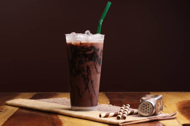 istock Ice cocoa soft drink on wood floor and topping 864942776