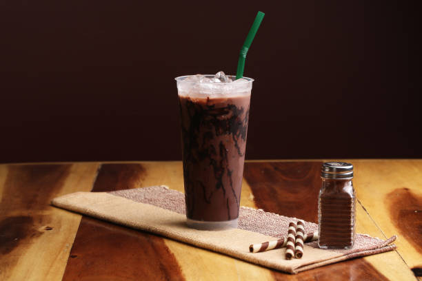 istock Ice cocoa soft drink on wood floor and topping 864946806