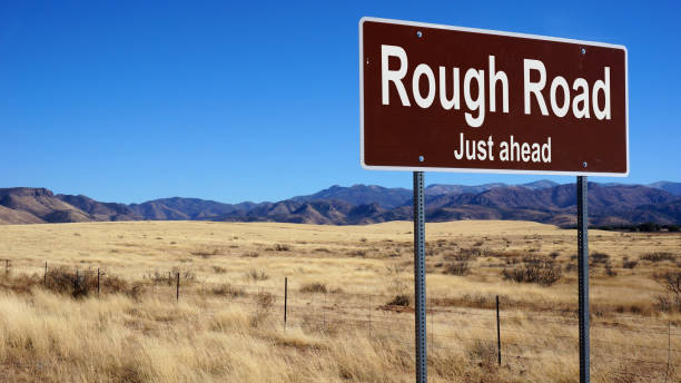 istock Rough Road road sign 864947528
