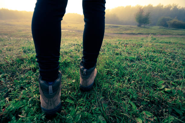 istock hiking legs in the sunrise 864950208