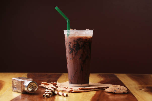 istock Ice cocoa soft drink on wood floor and topping 864951674