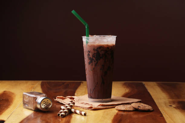 istock Ice cocoa soft drink on wood floor and topping 864951782