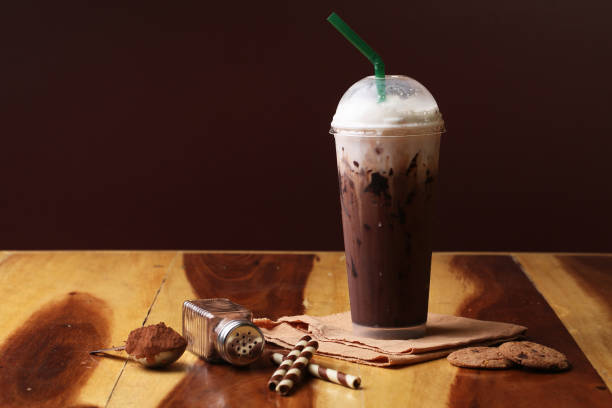 istock Ice cocoa soft drink on wood floor and topping 864957940