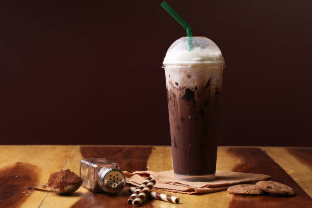 istock Ice cocoa soft drink on wood floor and topping 864958002