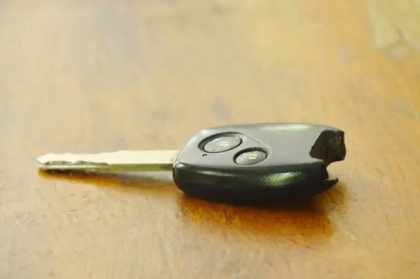 Photo of broken car remote key on table