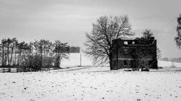 istock snow covering an abandoned farm 864962172