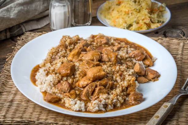 istock Barley groats with stewed meat. 864969064