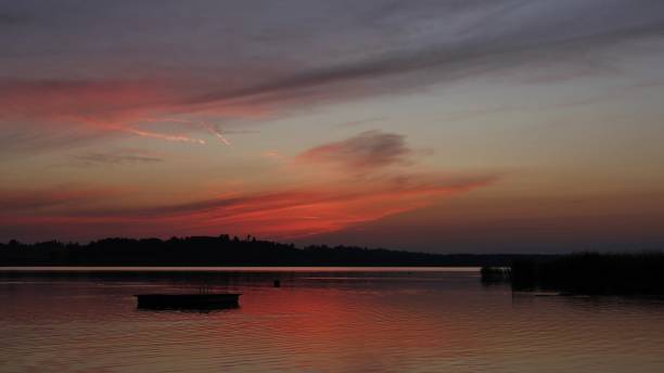 istock Romantic sky over lake Pfaeffikon, Switzerland. Summer scene. 864970024