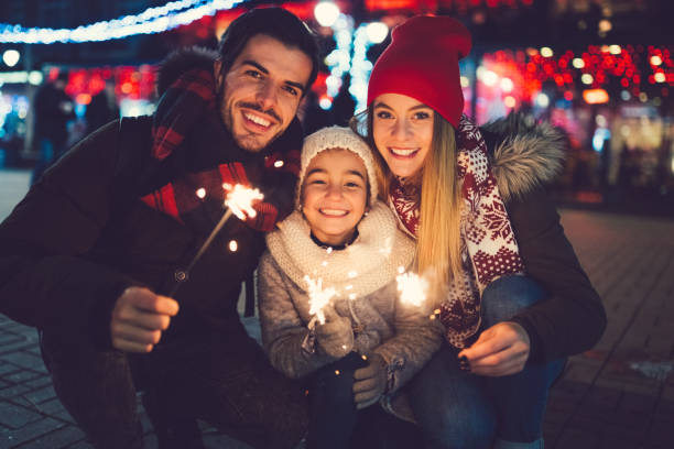 istock Young family spending Christmas outside 864984302