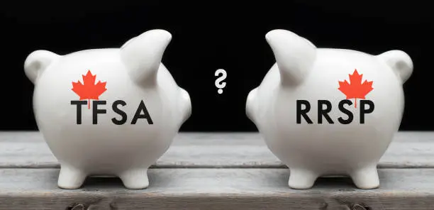 Photo of Financial concept depicting the choice between investing in TFSA or RRSP for Canadian