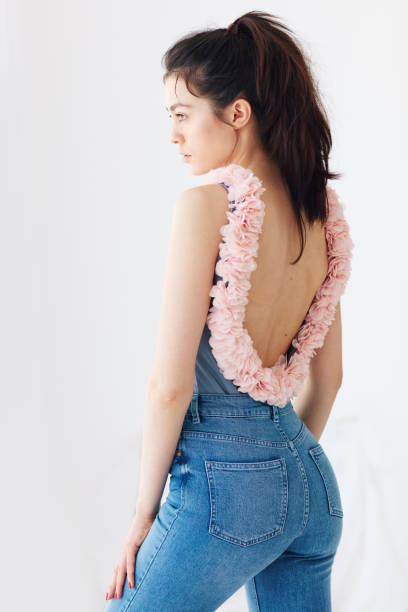 istock young attractive girl posing on model test shoot with natural day light 864995690