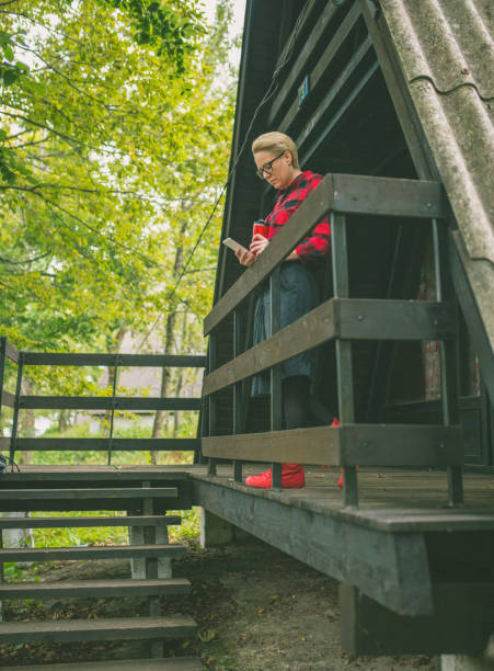 istock woman on an old porch 864998104