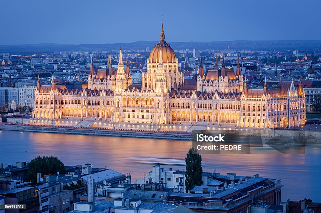 Budapest Parliament at night Budapest Parliament, Hungary. The Parliament building on the Danube river in Budapest, Hungary. Budapest is a large european city and the Hungarian capital with more than 1,7 million inhabitants Budapest Stock Photo
