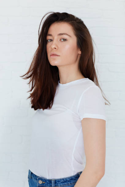 istock young attractive girl posing on model test shoot with natural day light 864998488