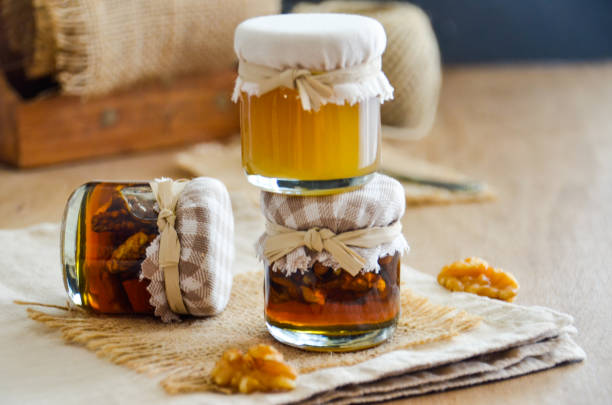 istock Honey in jar and bunch of dry lavender 865002204