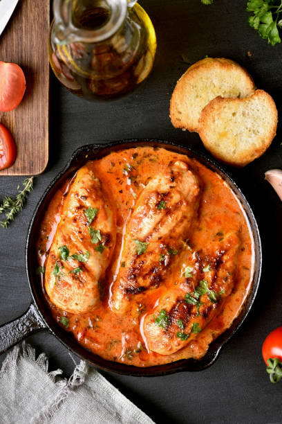 istock Chicken breast in tomato sauce 865002564