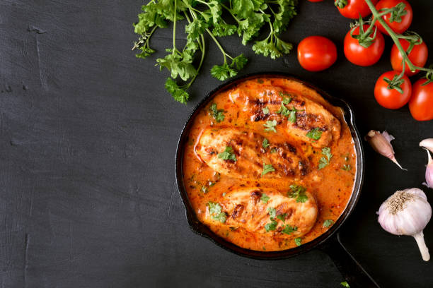 istock Chicken breast in tomato sauce 865002574