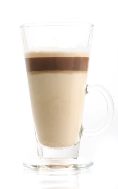 istock Latte macchiato in transparent glass isolated on white backgroun 865019516