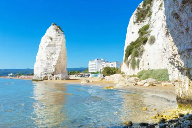 Beach of Pizzomunno rock, in Vieste, Gargano coast, Apulia, South of Italy