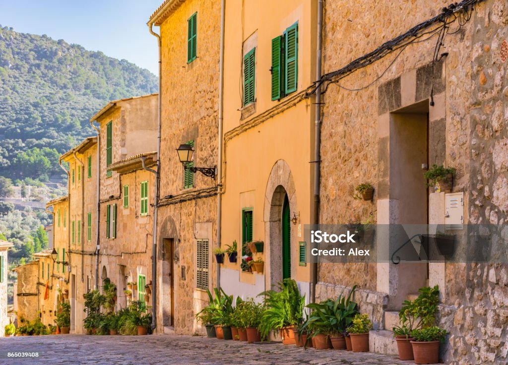 Beautiful street at the old village Valldemossa on Mallorca, Spain Balearic Islands Famous village Valldemossa on Majorca, Spain. Rustic Stock Photo