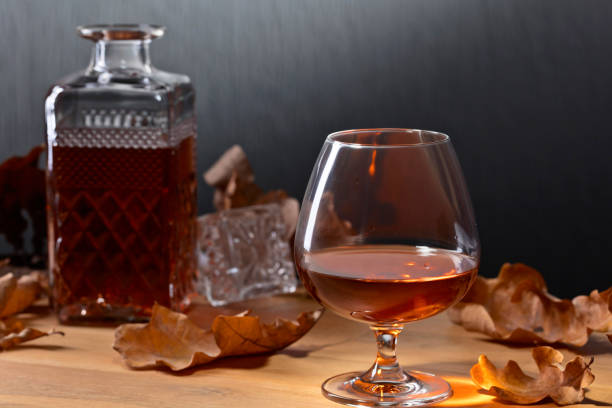 istock Brandy and dried up oak leaves . 865041988