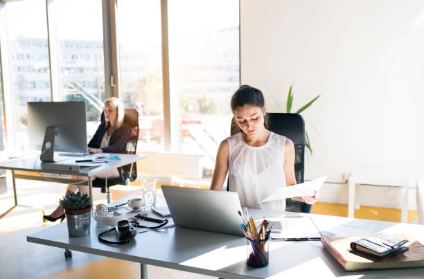 istock Two businesswomen in the office working together. 865043072