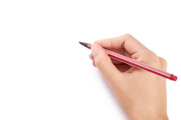 istock Woman hand writing with a pen isolated on white background 865059494