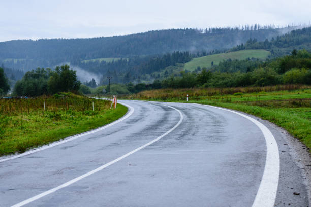 istock empty road in the countryside in autumn 865060092