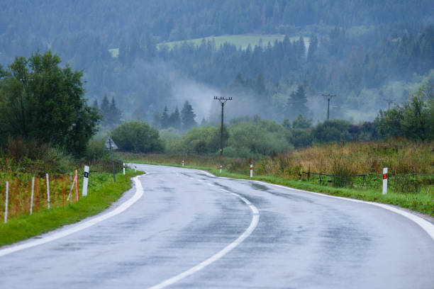 istock empty road in the countryside in autumn 865060098