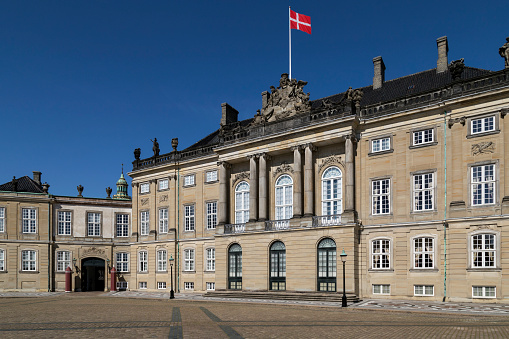Amalienborg Palace - Copenhagen - Denmark. Amalienborg is the home of the Danish royal family and a popular tourist attraction.