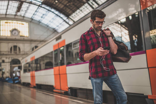 istock Checking the phone on the station 865074880