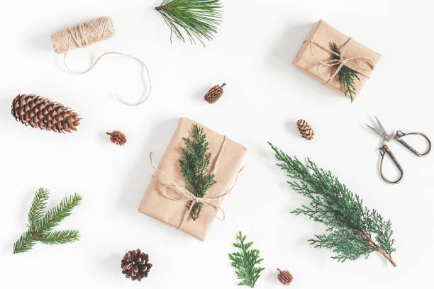 istock Christmas gifts, different winter plants. Flat lay, top view 865074884