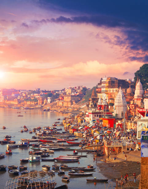 Holy town Varanasi and the river Ganges Holy town Varanasi and bank of the Ganges river with ghats ghat photos stock pictures, royalty-free photos & images