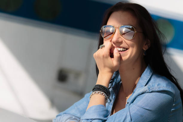 Happy young woman Happy young woman in nature. Springtime, noon. beautiful multi colored tranquil scene enjoyment stock pictures, royalty-free photos & images