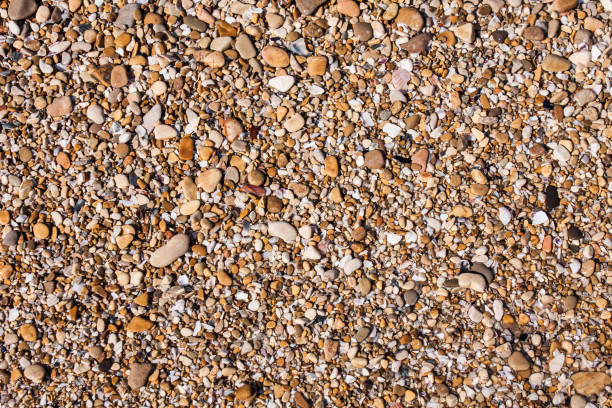 istock Rocks and Stone beach pattern closeup, Summer seacoast background 865081038