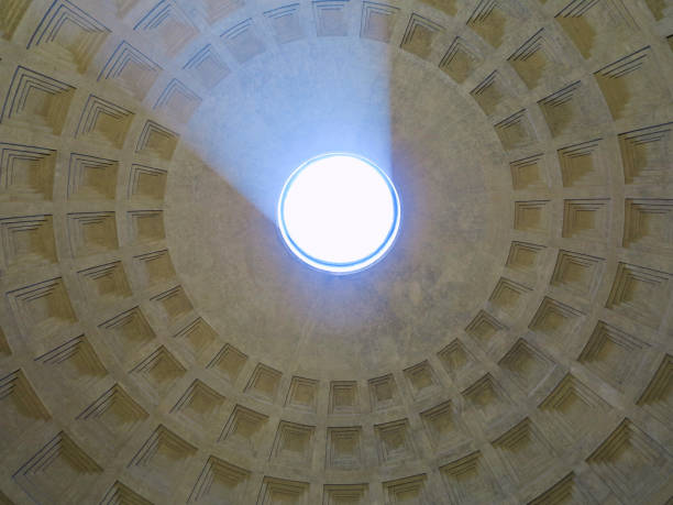 istock antheon dome as seen from inside the Pantheon with a visible light beam coming through the open hole. 865084466